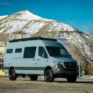 TOURIG Sprinter 170 Banner custom grey blue van build in front of a mountain range in Colorado