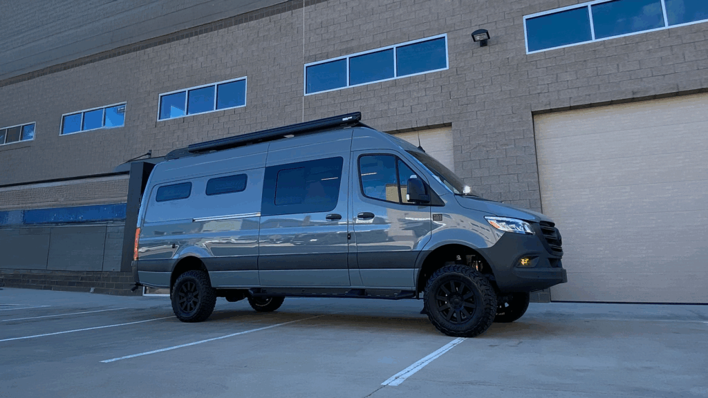 TOURIG Banner Sprinter camper van interior with wet bath and rear garage