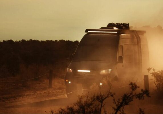 Custom Sprinter van by Tourig offroading in the desert