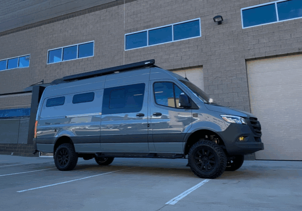 TOURIG Banner Sprinter camper van interior with wet bath and rear garage